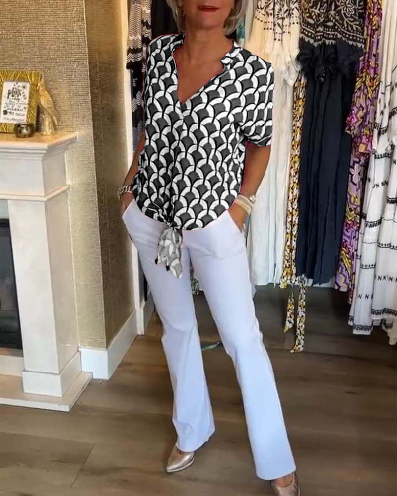 Ageless Elegance: Geometric V-Neck Top