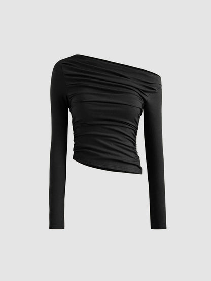 Top Asimmetrico: l'eleganza che valorizza