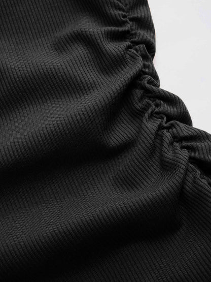 Top Asimmetrico: l'eleganza che valorizza
